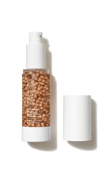 jane iredale front bottle showing label and tinted serum benefits