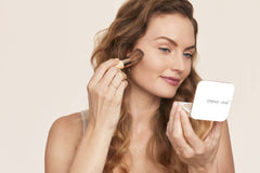 jane iredale application with kabuki brush delivering buildable, airbrushed coverage