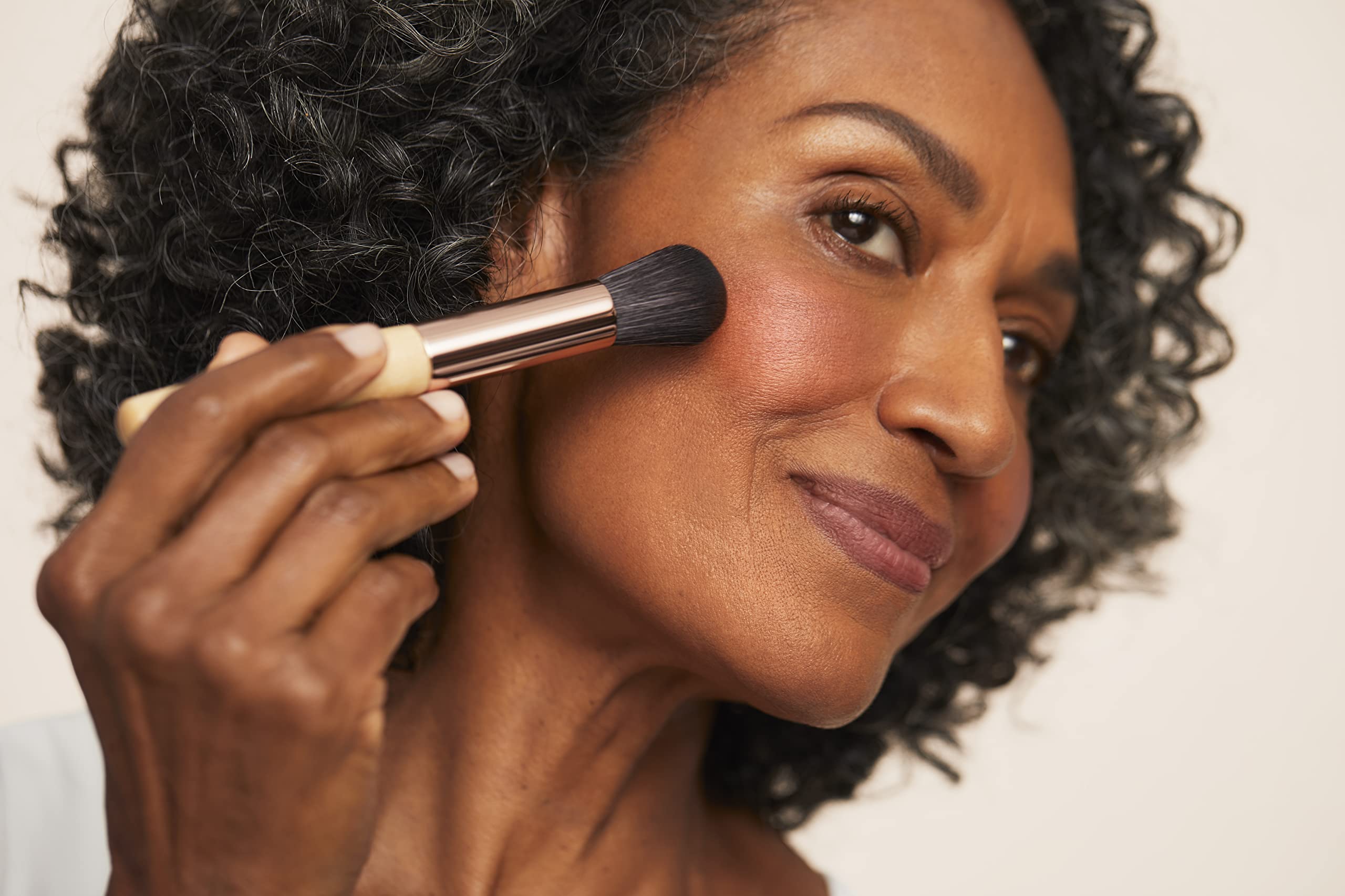 jane iredale swatches on arm showing true-to-tone payoff benefit: shade selection