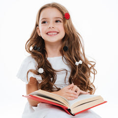 Janinka barrettes worn in toddler hair demonstrating gentle hold benefit
