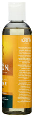 Bathroom shelf scene with JASON oil by towel conveying post-shower hydration benefit