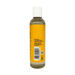 Pouring JASON oil into hand demonstrating easy application and quick hydration