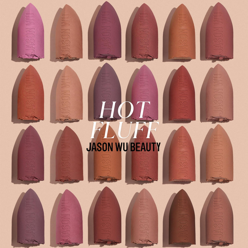 Jason Wu Hot Fluff lifestyle flatlay with brushes showing multi-use convenience