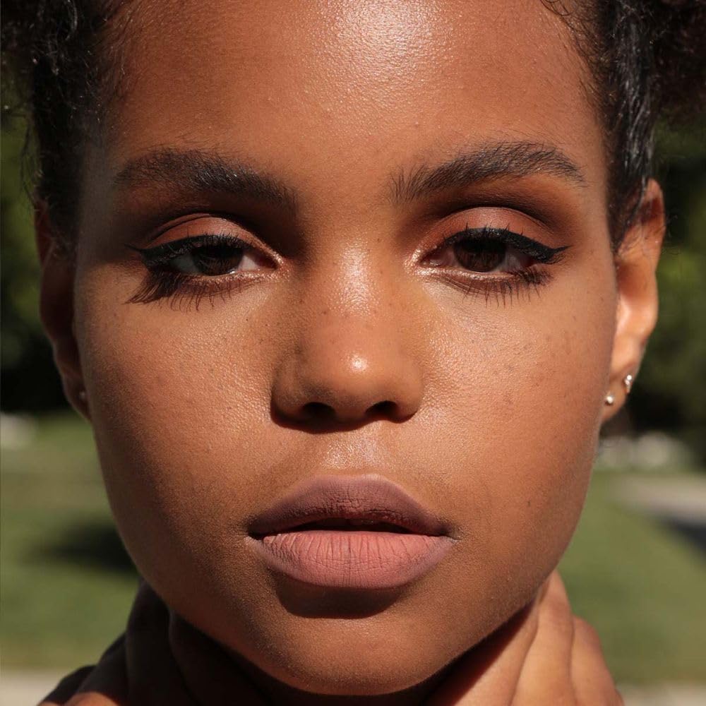 Jason Wu model wearing freckles for a radiant, customizable daytime look