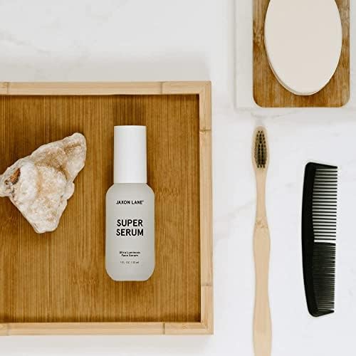 JAXON LANE bottle beside moisturizer illustrating layering compatibility benefit