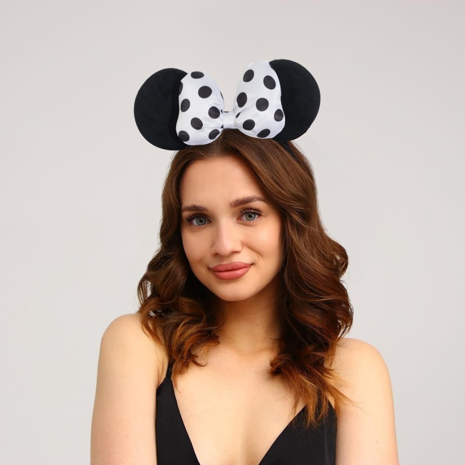 Jeffan headband on girl at party showcasing playful costume accessory and photo appeal