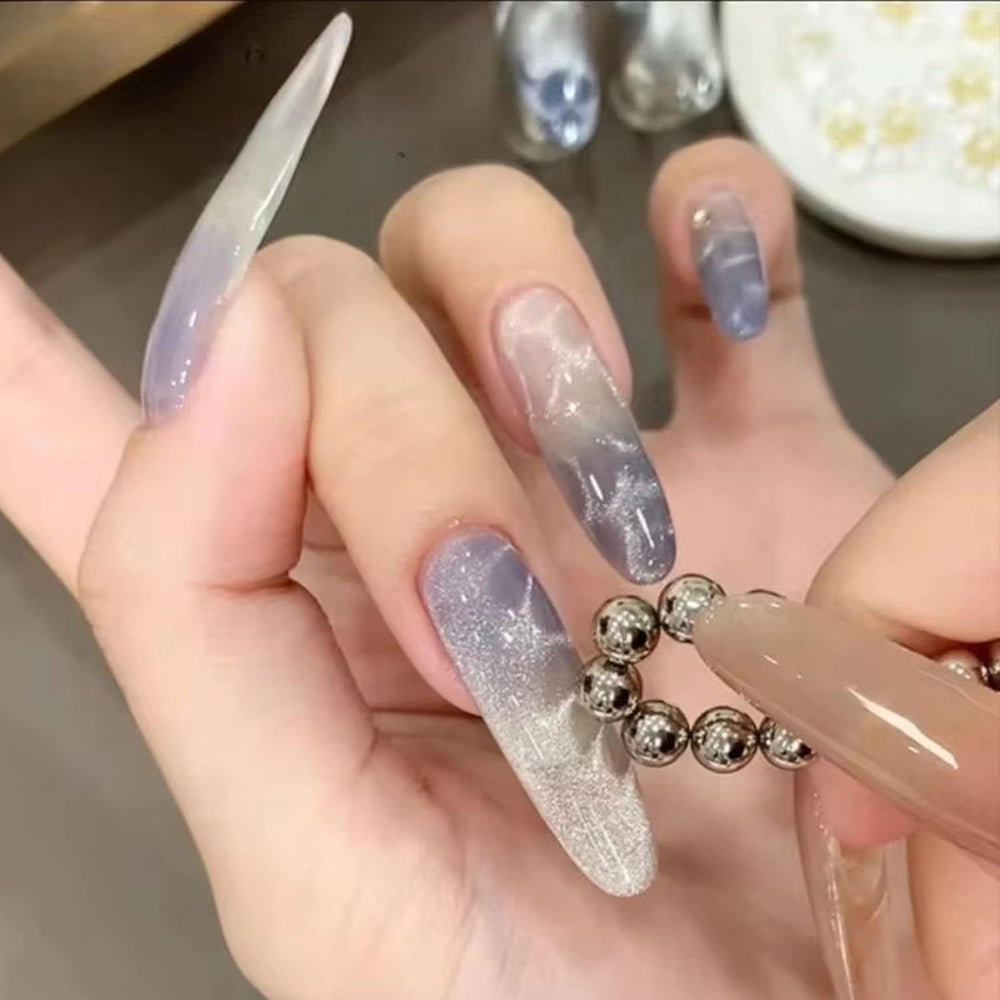 JERCLITY magnet held over nail demonstrating quick cat-eye polish effect benefit
