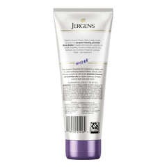 Jergens 7 oz tube next to everyday items to show compact convenience