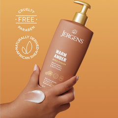 Hand applying Jergens lotion to forearm for touchably smooth skin