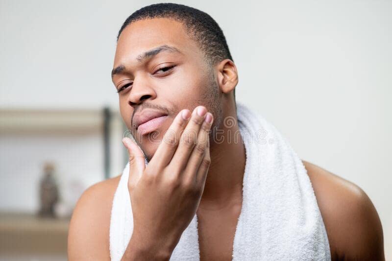 Jersey Botanical shea butter scoop applied to skin for instant moisturize