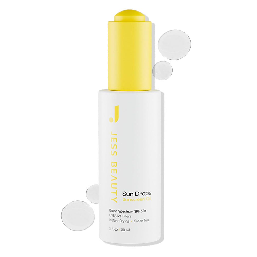 JESS BEAUTY front bottle view showing SPF 50 sunscreen oil benefits