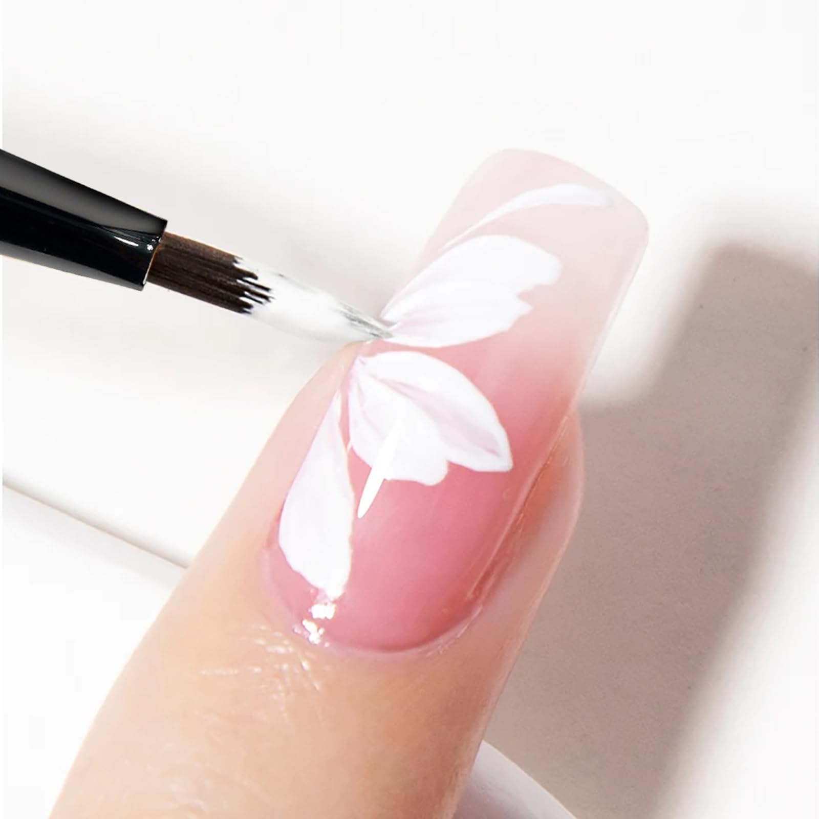 JFIYUOMCI triangular tip close-up delivering precise petal strokes
