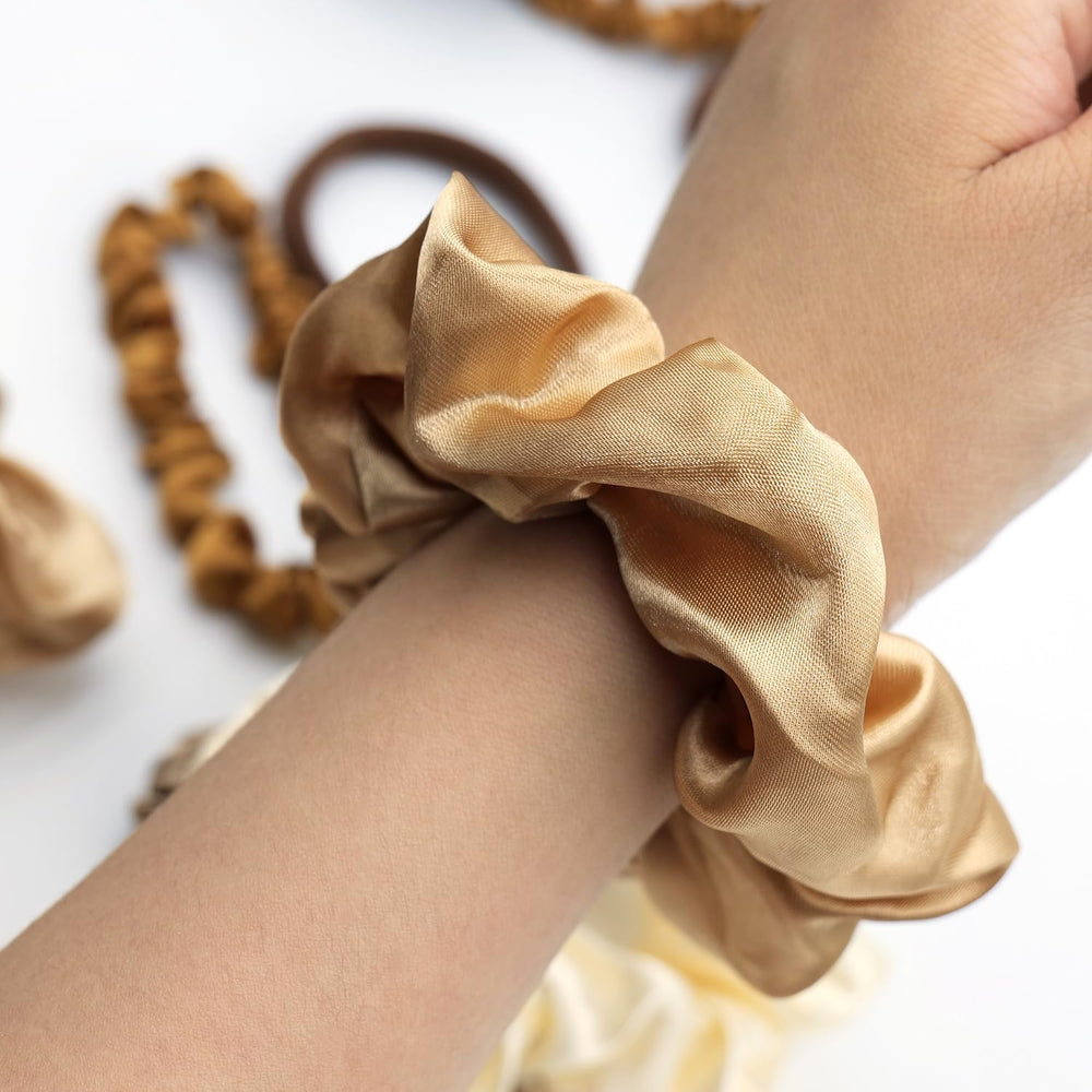 JGQUR scrunchie in ponytail demonstrating comfortable hold and minimal creasing