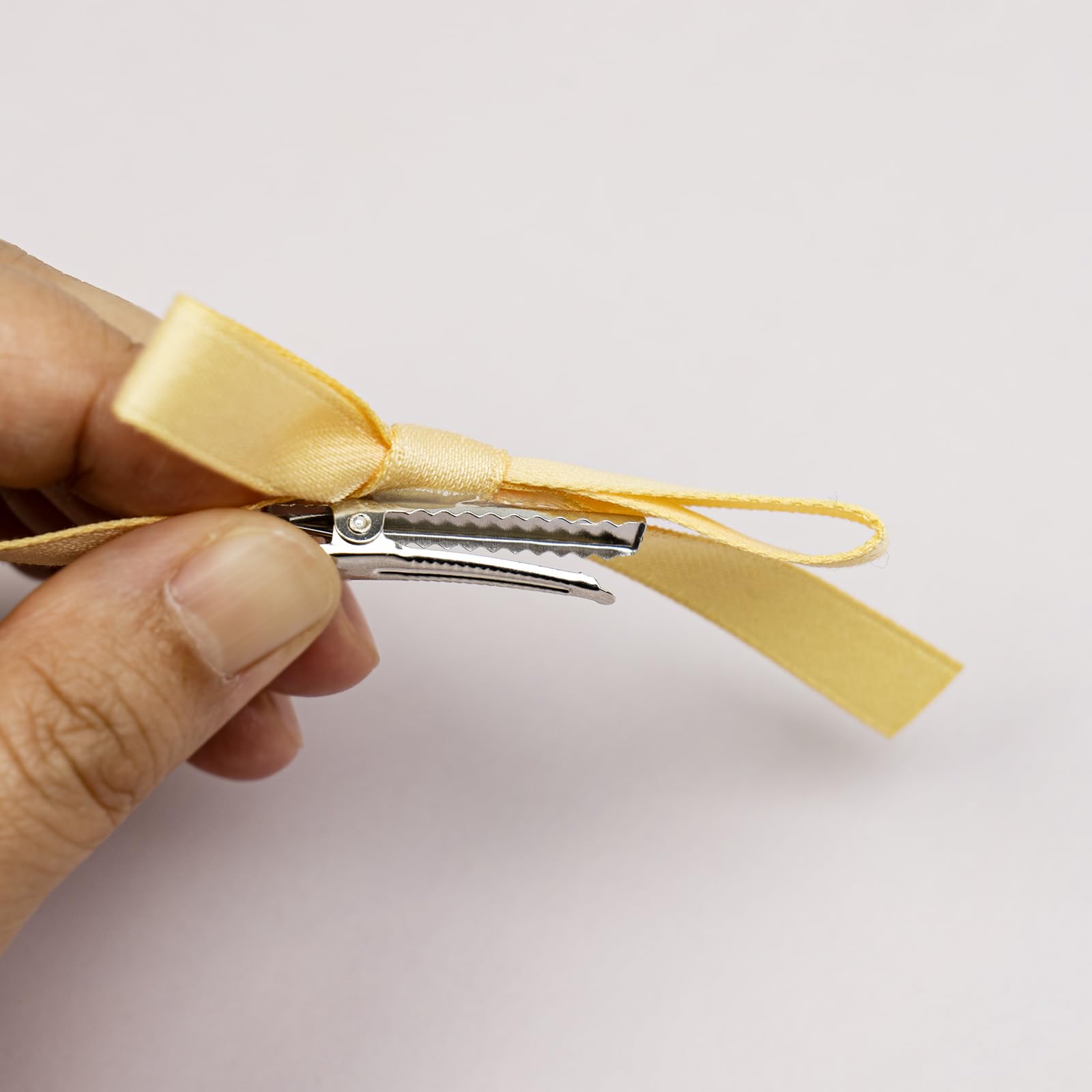 JGQUR multiple clips used on braids, buns and ponytails showing versatile styling