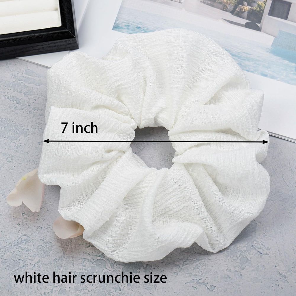 JGQUR scrunchie stretched to reveal elastic core and secure grip