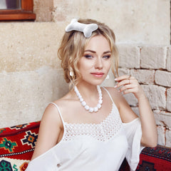 JiaDuo bone clip worn in half-up hairstyle demonstrating strong hold