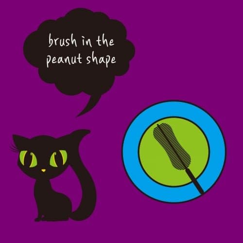 Jigott peanut-shaped brush closeup demonstrating precise lash reach