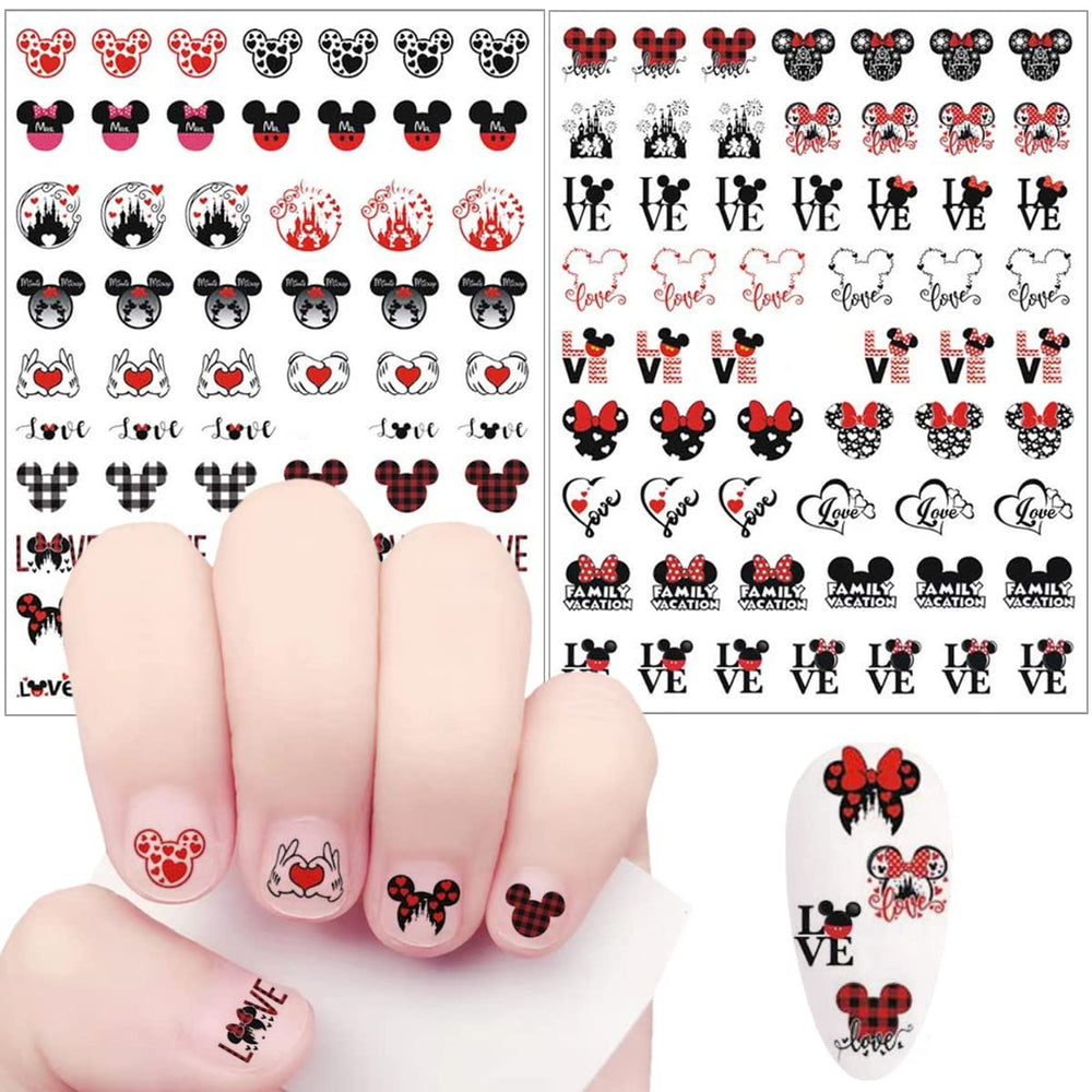 JinPren valentines manicure on hands in cozy setting showcasing playful nail décor