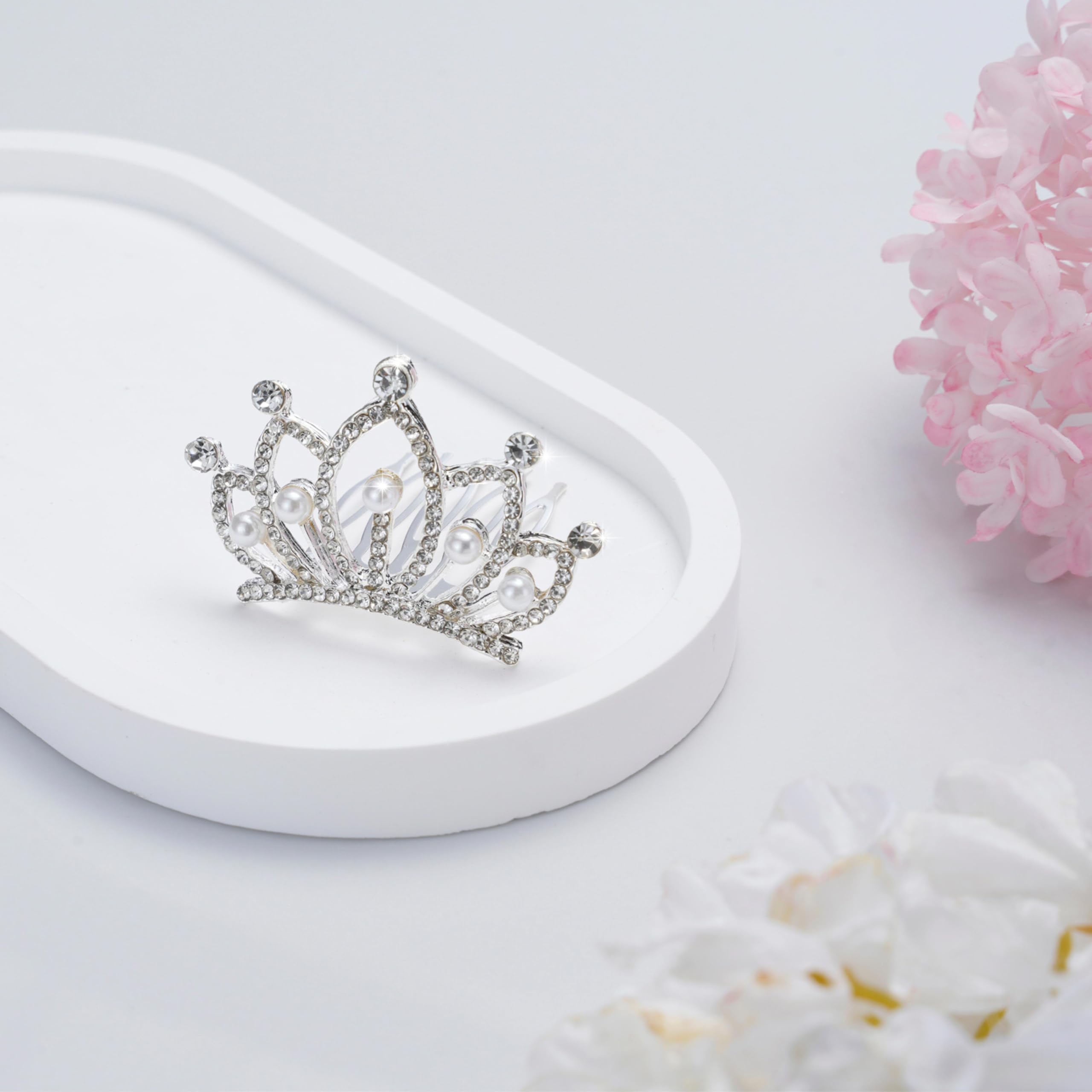 JINYEAH tiny tiara worn with an updo adding elegant sparkle benefit
