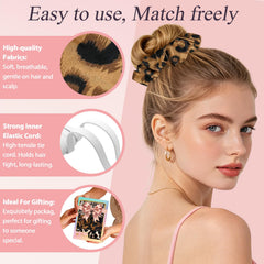 JIRIS scrunchie next to a hand showing scale and generous size.