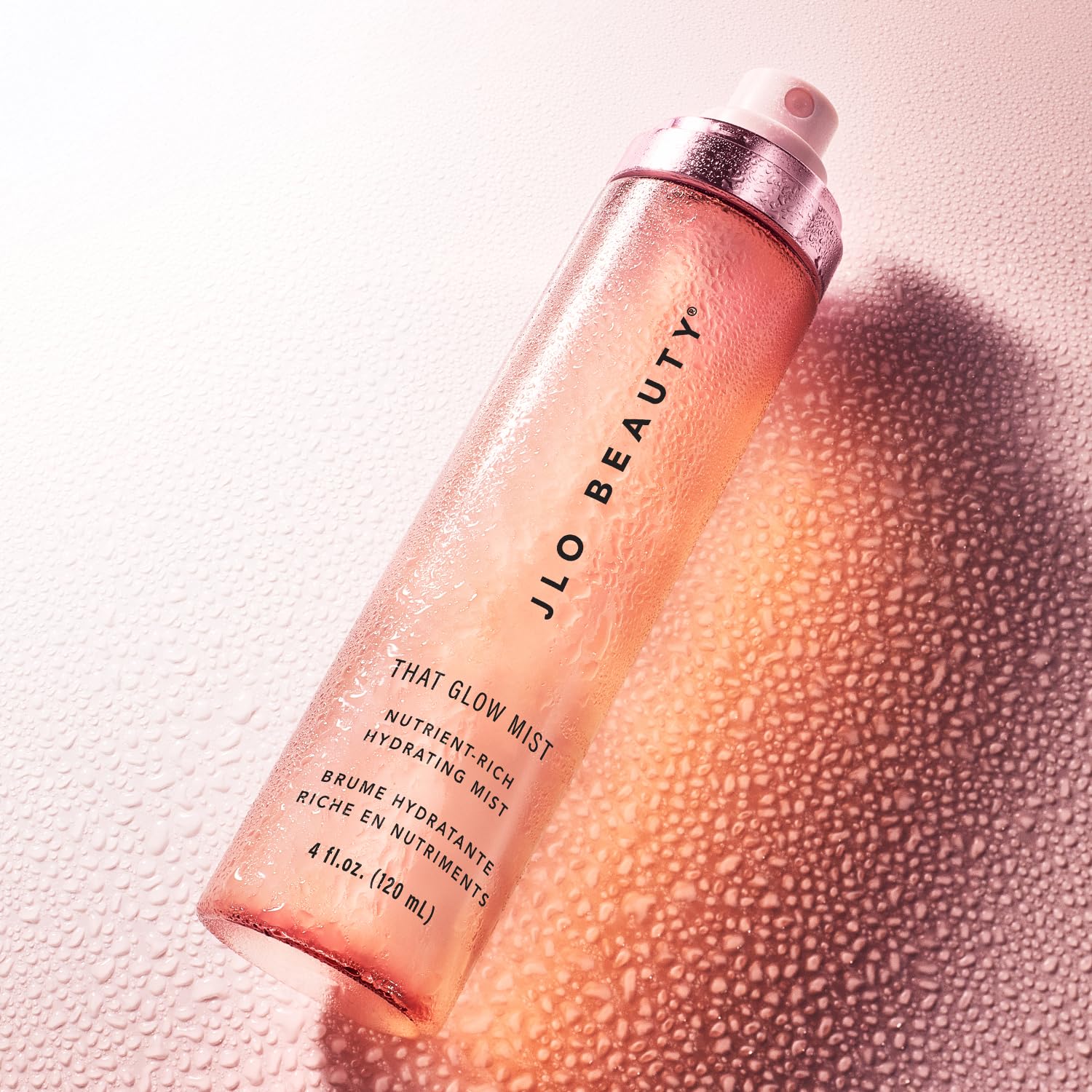 JLO BEAUTY placed beside glass representing skincare ritual and freshness