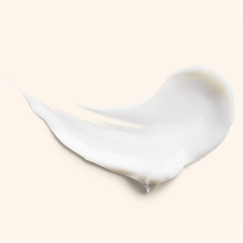 JLO BEAUTY jar open close-up revealing creamy texture, shows hydration