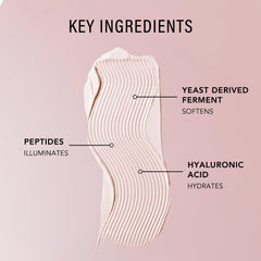 JLO BEAUTY next to a lipstick to show jar scale and travel-friendly size benefit