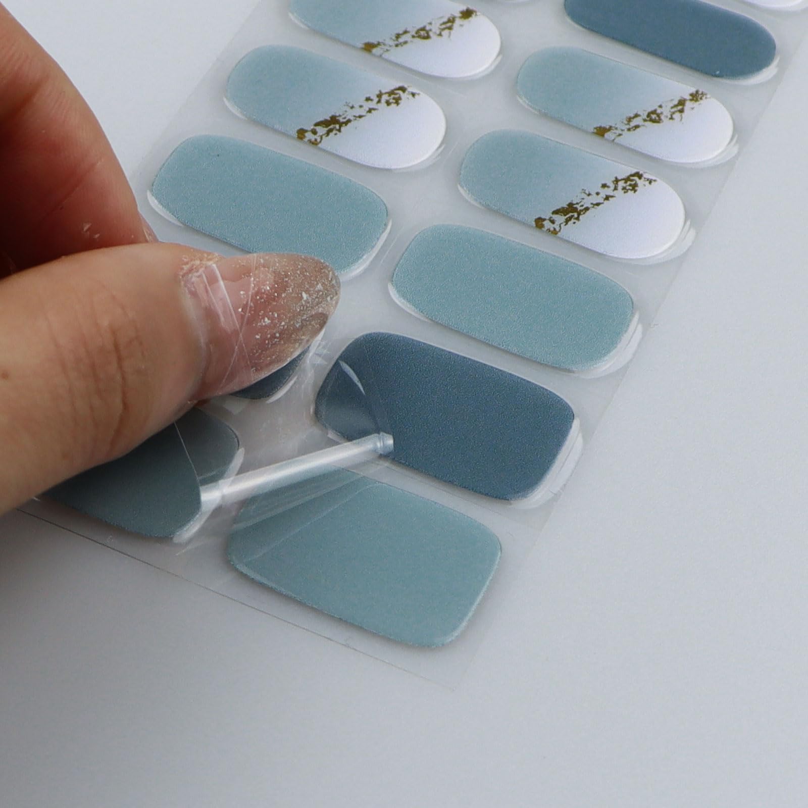 jmeowio strip curing under LED lamp showing final glossy shine
