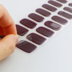 jmeowio wine red strips applied on natural nails for salon-style look
