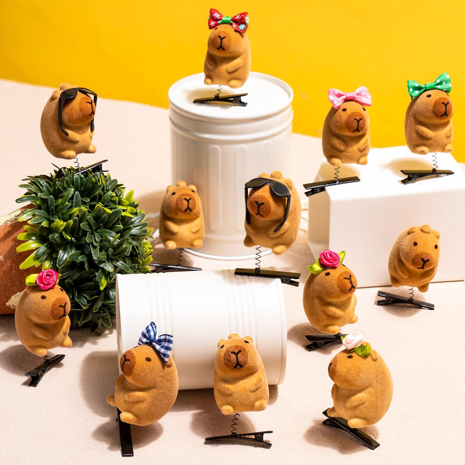 JMZYJZH twelve capybara clips laid out to highlight each unique design