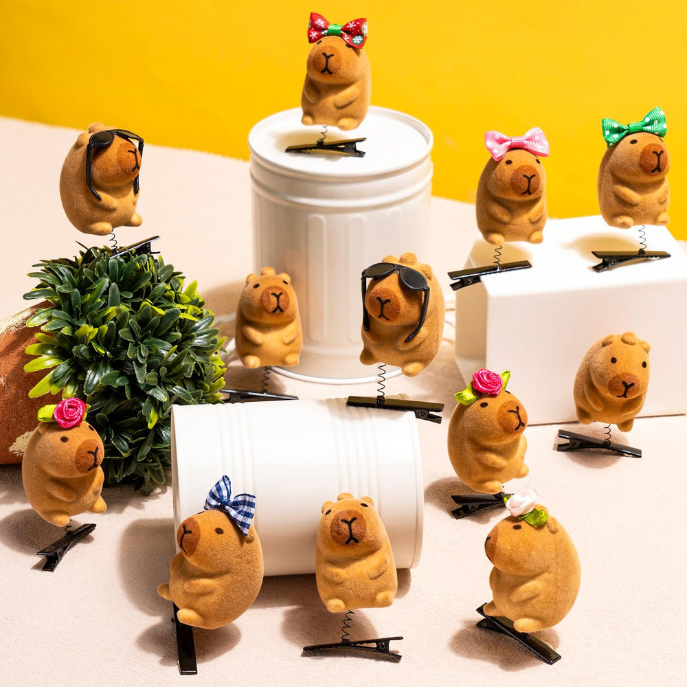 JMZYJZH twelve capybara clips laid out to highlight each unique design
