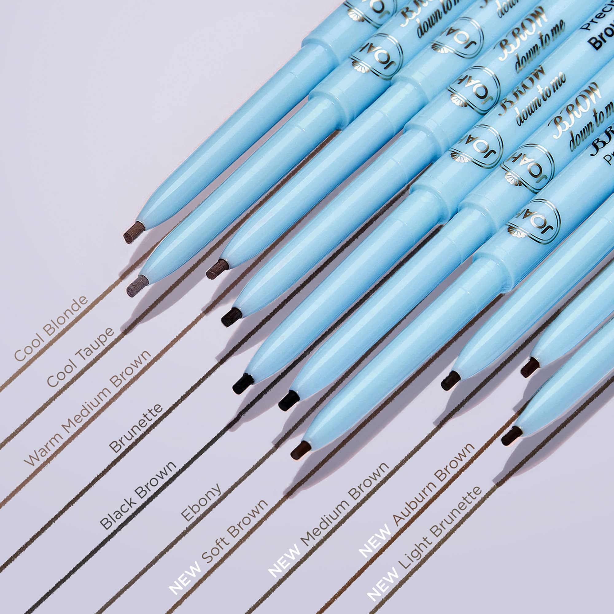 JOAH pencil size comparison next to fingers showing compact travel-friendly design
