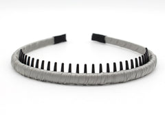 JOBAND headband on model in yoga pose keeping hair away for focus