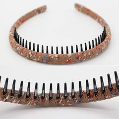 JOBAND resin teeth detail showing rounded teeth for gentle grip and non-slip hold