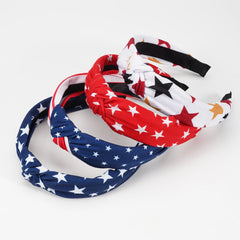 Jocbean headband worn at a parade showing secure fit and all-day hold