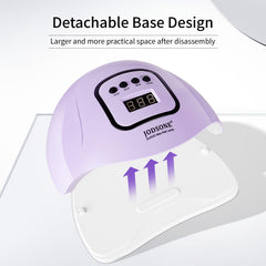 JODSONE lamp next to a hand for size comparison and portable convenience benefit