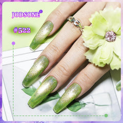 JODSONE magnet held over wet polish creating a defined cat-eye stripe for dramatic effect