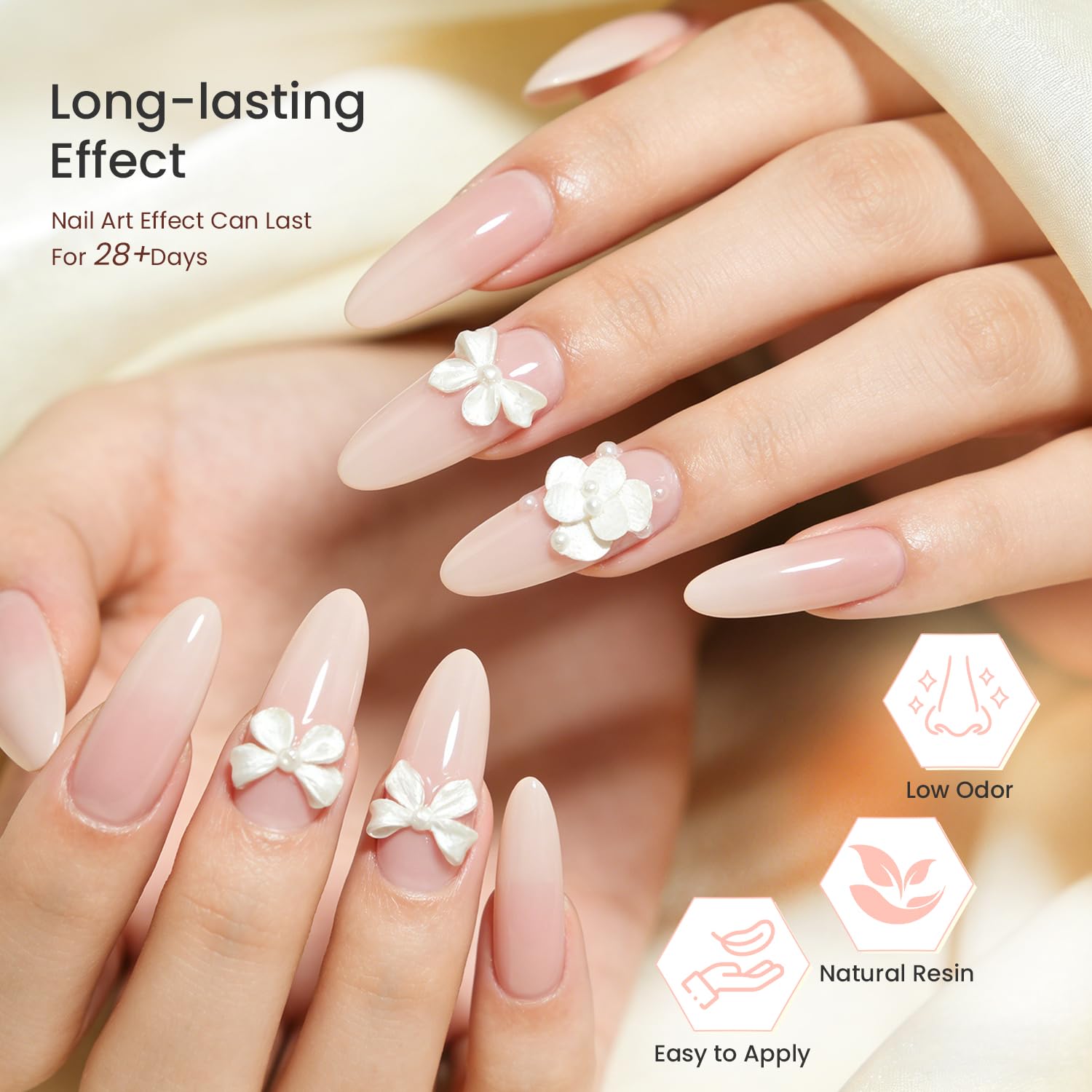 JODSONE finished manicure on hand showcasing elegant pearl white 3D design