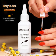 JODSONE 100ml bottle next to ruler showing its compact size