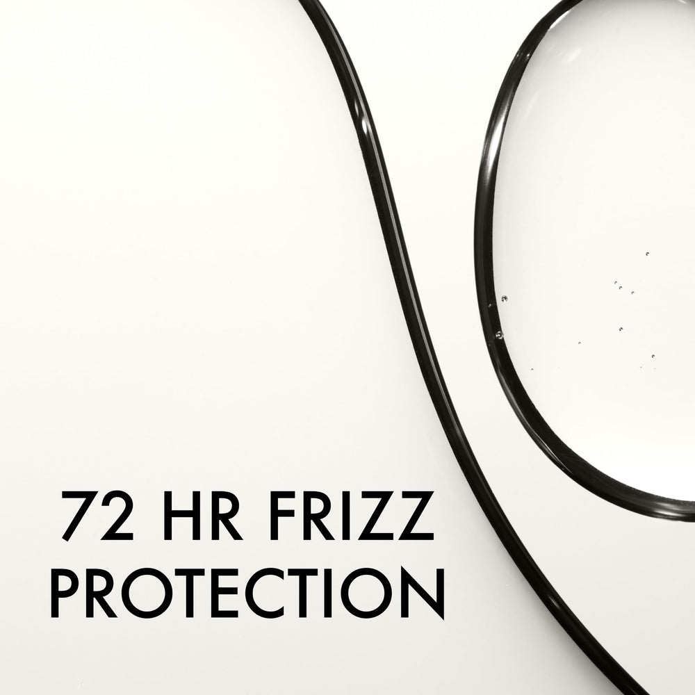 John Frieda serum smoothed on dry hair targeting flyaways and frizz