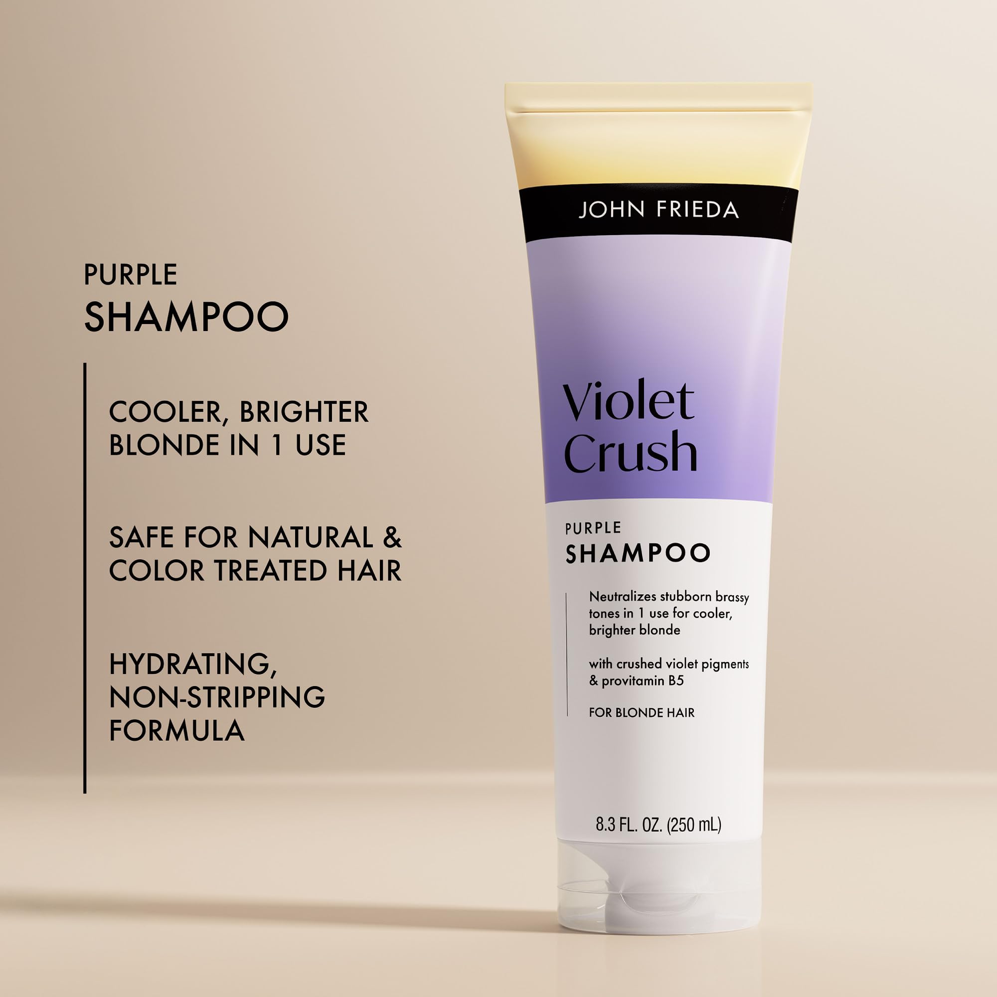 John Frieda being applied to wet hair to neutralize brass and refresh tone