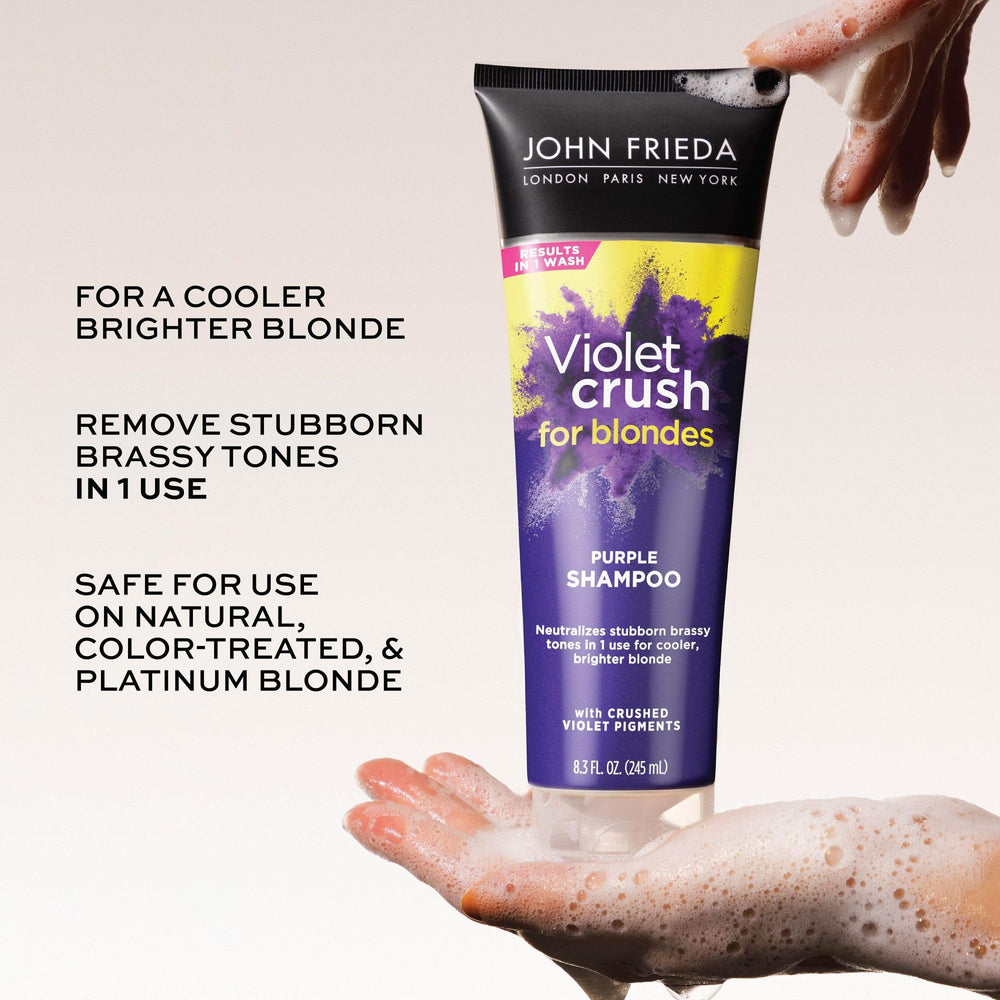 Pouring John Frieda purple shampoo to show crushed violet pigment texture and control
