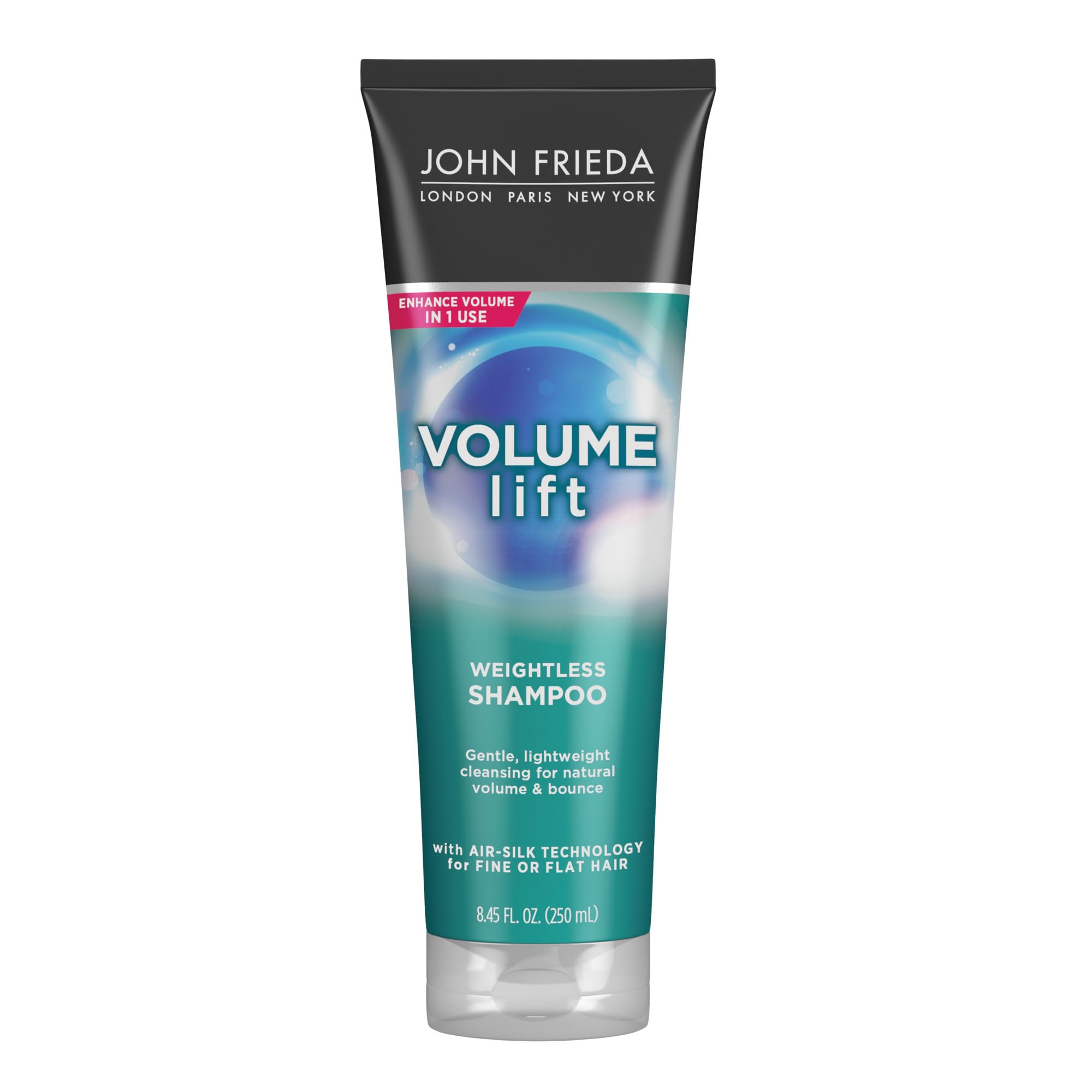John Frieda bottle front view showing product and perked-up styling benefit