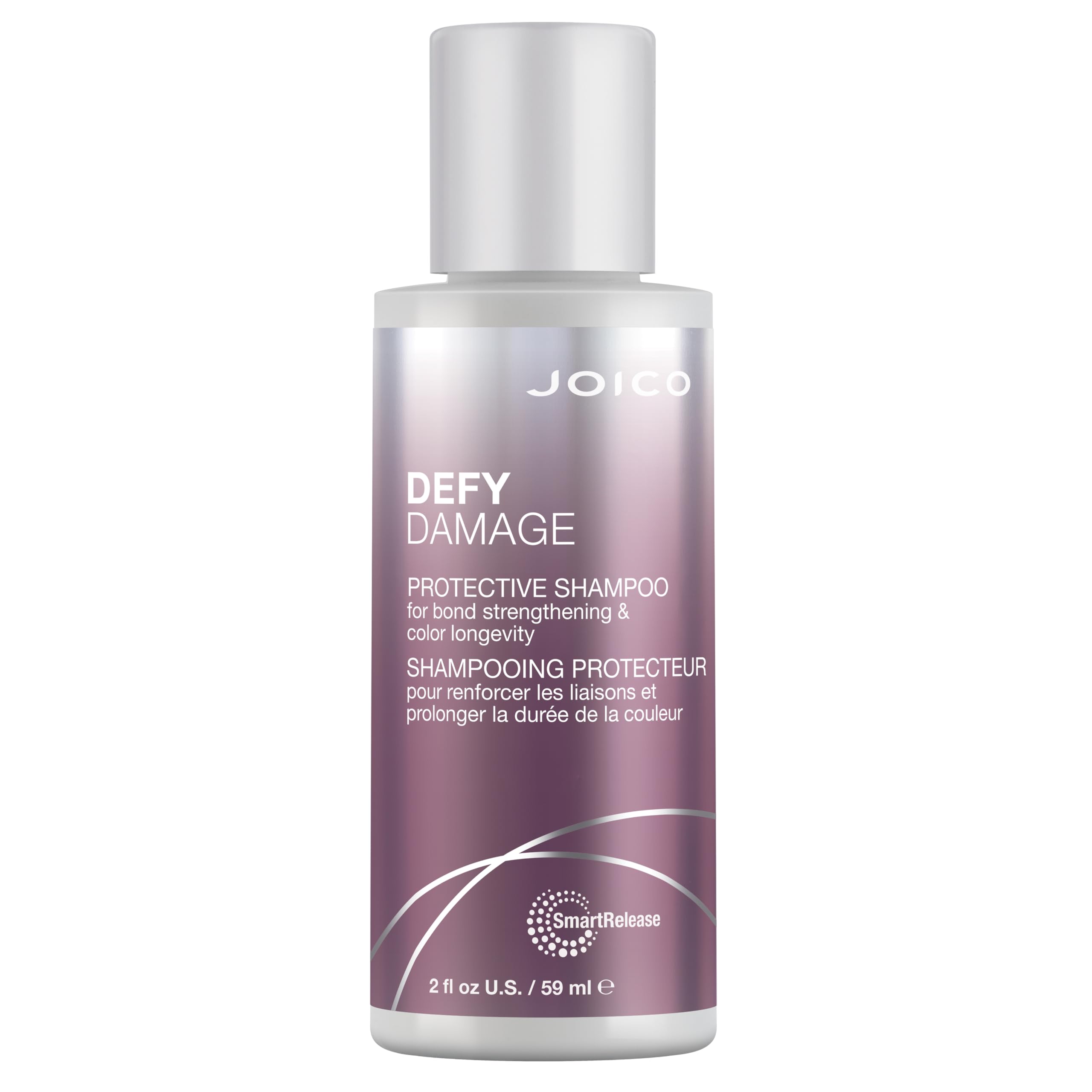 Joico Defy Damage shampoo being poured to show smooth texture and ease of use