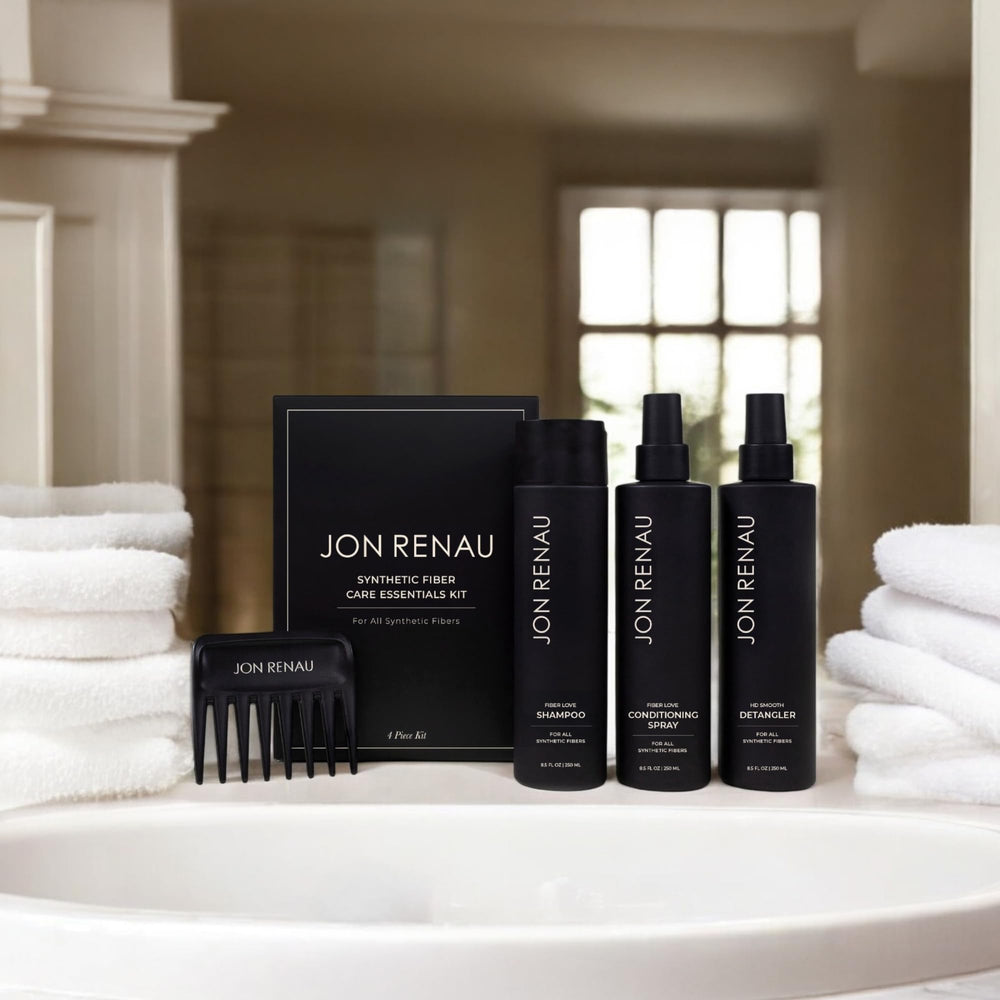 Jon Renau detangler spray being applied to synthetic hair for easier brushing
