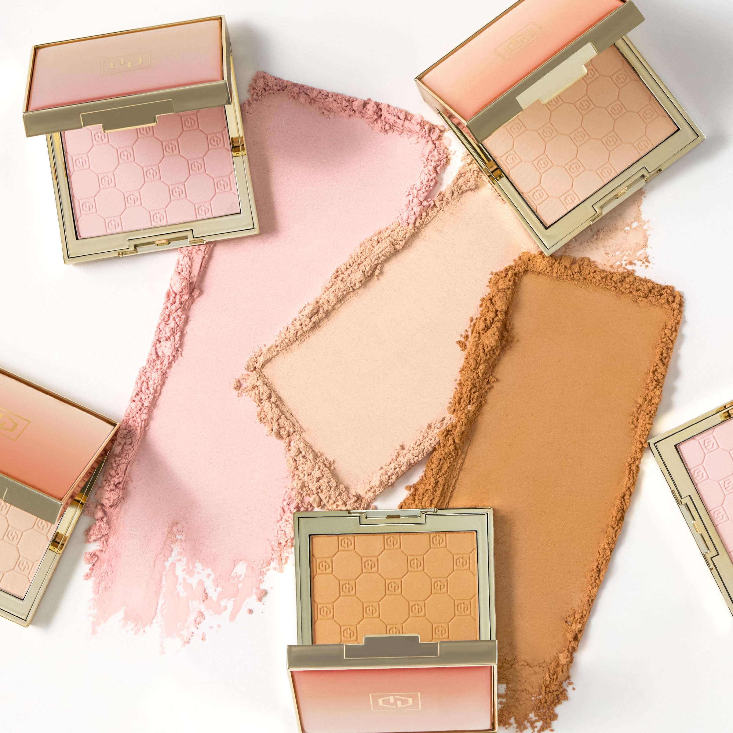 Jouer compact next to lipstick for scale showing travel-friendly size and on-the-go refresh benefit