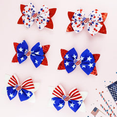 JOYRUBY girls wearing bows at a family July 4th photo for festive styling benefit