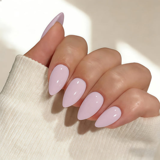 JOYVVEW close-up of almond-shaped glossy nails highlighting natural sheen