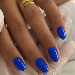 JOYVVEW front packaging showing 32-piece blue press-on nail kit and tools for quick manicure