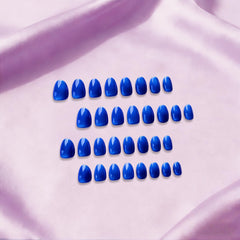 JOYVVEW nails applied on hand demonstrating natural short oval fit and comfortable wear